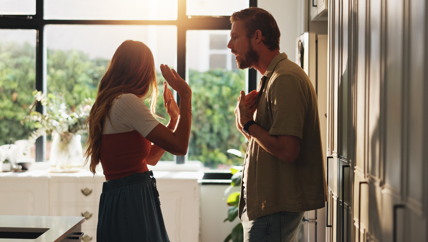 a couple arguing in their apartment